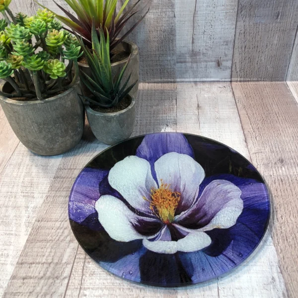 Photo of columbine round cheese board trivet