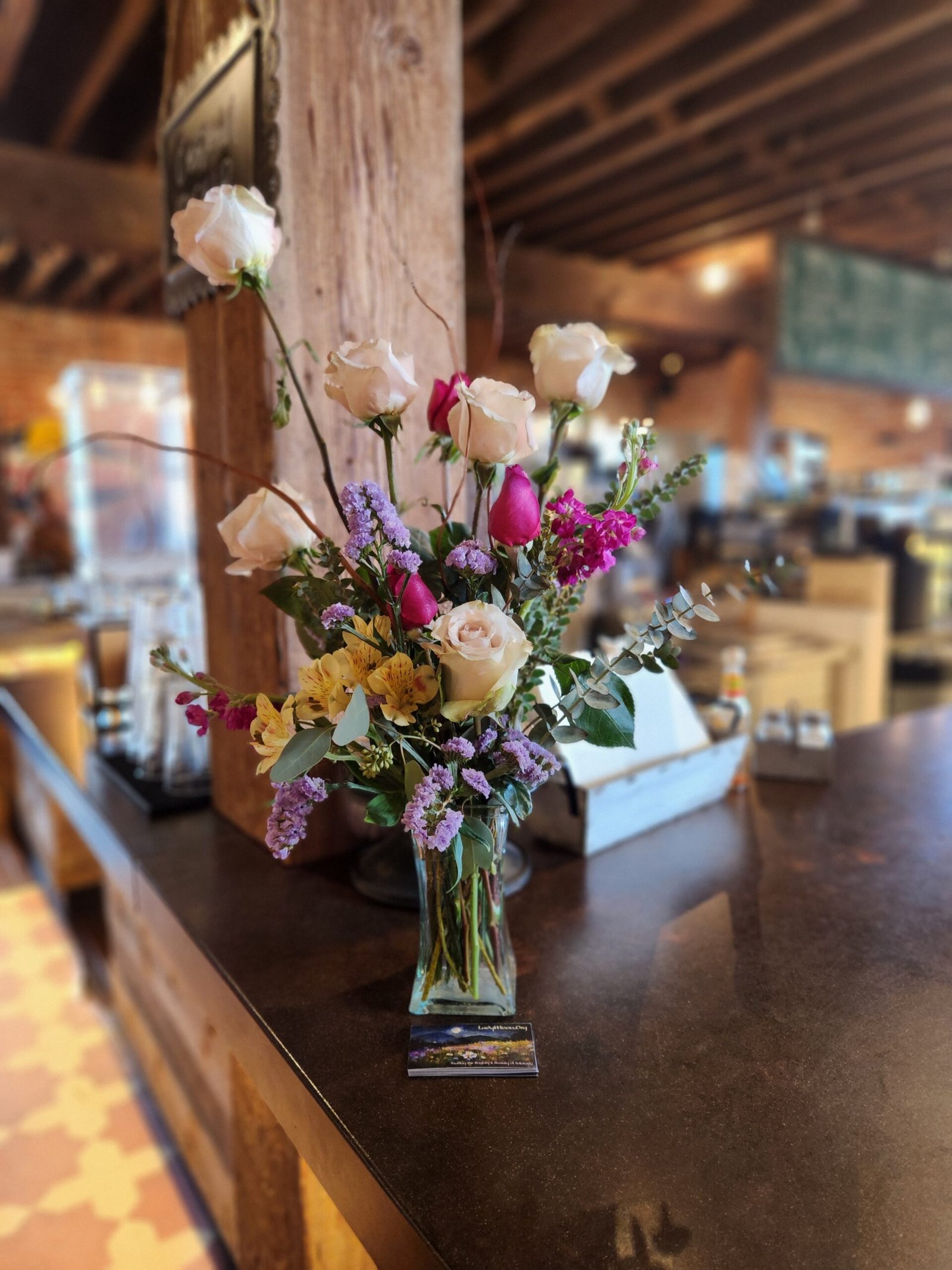 Floral bouquet on cafe counter