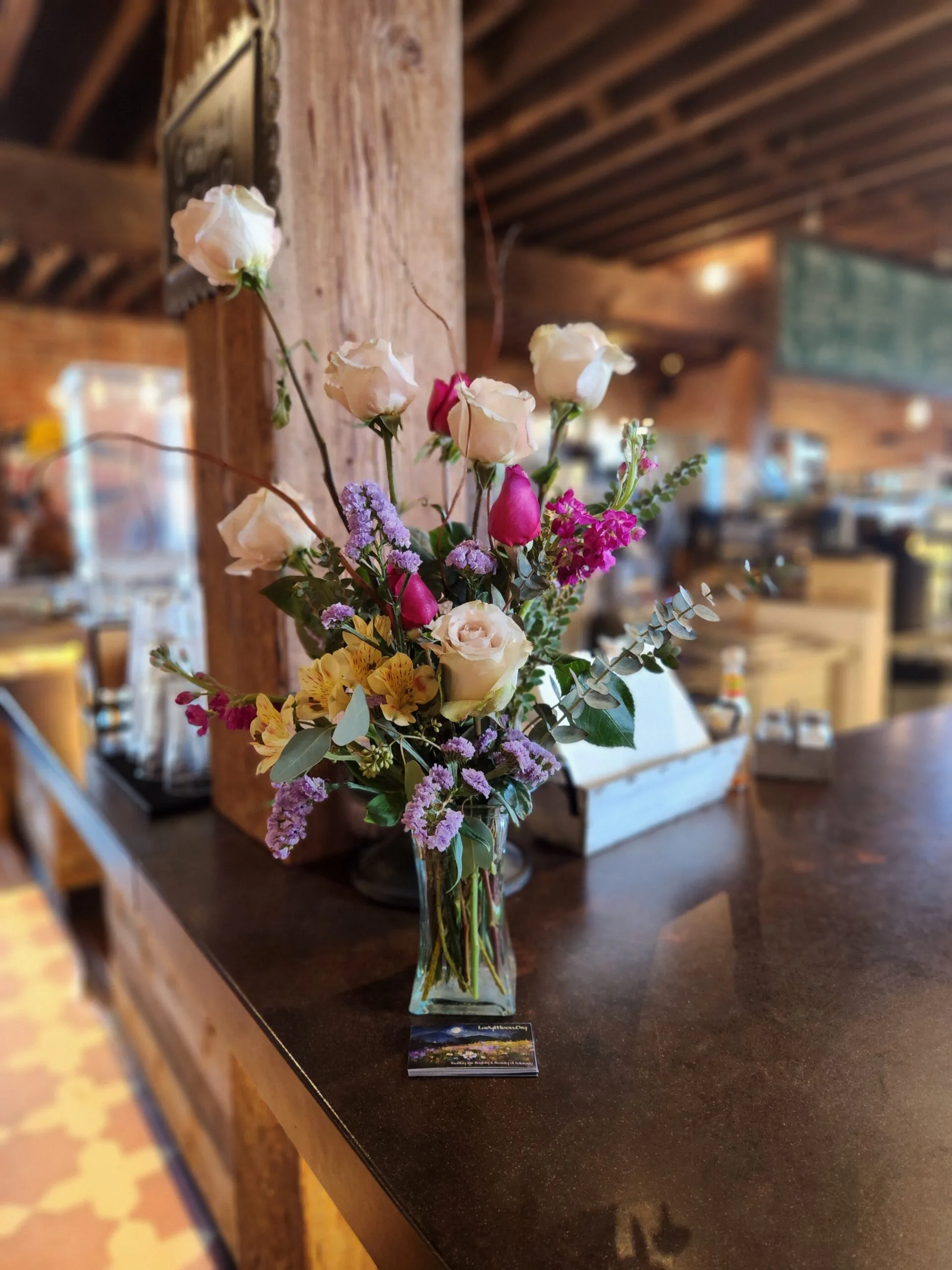 Floral bouquet on cafe counter
